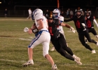 Monticello senior Tommy Morrison (#1) makes a tackle on a Water Canyon ball carrier on October 17 as teammates Canyon Christensen (#11) and William Rogers (#8) pursue. The Buckaroos smacked the Wildcats 53-6, finishing the regular season with a 4-5 record. The seventh-ranked Bucks will open the Utah 8-Player State Tournament against #10 Monument Valley this Friday, October 24 in Monticello.  Anna Fredericks photo