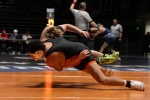 Camren Carpenter throws his opponent to the mat in the state finals. Anna Fredericks photo