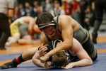 Whitehorse Raider Marcus Denny works at the 1A state wrestling tournament.  Denny earned a third place finish at the tournament while leading the Raider wrestlers.  Anna Fredericks photo 