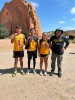 In the photo are: (left to right) Ethan Begay, Elam Etsitty, Lamyia Benally, and Coach Boyd Silversmith.  Carolene Johnson photo