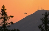 helicopter carries a load of water toward Abajo Peak submitted by Talmage Nielson,