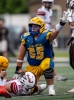 San Juan senior Remy Whatcott displays a fearsome battle face after taking down Grantsville running back Rigdon Murdock in the opening game of the season August 15 in Ephraim. The Broncos avenged their 2024 loss to the Cowboys with a 26-7 drubbing in which the defense showed dominance.  Dave Argyle photo - dbaphotography.com