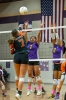 Naomi White and Malaya Blackmountain challenge a Monticello shot at the net as part of a five-set win against Monticello. Lee Ke Photo
