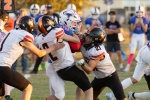 Monticello defenders (left to right) Grant Wigginton, Avery Hedrick, and John Leber try to bring down Norwood running back Cole Bray on September 11. The Mustangs handed the Buckaroos their first loss of the season in Norwood.  Anna Fredericks photo