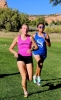 Monticello senior Ayla Carling finished 15th at the Red Rock Invitational. San Juan Runner Sincere Nez runs alongside Carling. Jessica Walker photo