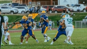 San Juan quarterback Beau Yeomans looks to distribute the ball downfield in the Broncos’ matchup with South Summit on September 11 as Gaige Palmer (#70) and Trey Bradford (#51) provide pass protection. Brigg Palmer is in the backfield with Yeomans, who passed for 279 yards and two touchdowns in the Broncos’ 58-28 win over the Wildcats in what was a rematch of the 2025 2A Utah State Championship Game. San Juan is ranked first in the initial 2A Utah football standings and will host #2 Delta this Friday on the