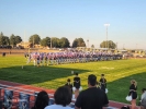 A patriotic tradition: The San Juan High School football team proudly displays American flags during the National Anthem prior to their game against Summit Academy on September 6. The Bronco players all run through their tunnel onto the field in a tradition that inspires patriotism and excitement at every home game in Blanding. San Juan went on to win the game over the Bears 48-6, improving to 3-1 on the year.  Kaylee Dalton photo