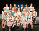 Members of the cast pose for a photo