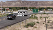 A new roundabout in Montezuma Creek sits at the center of the recently completed “Energy Corridor” road project.  The $152 million project included repaving major portions of Highways 162 and 262, in addition to a new bridge at McElmo Creek and the roundabout. See more photos at the San Juan Record website at sjrnews.com.  UDOT photo