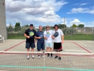 The Whipple and Morris team (dark shirts) defeated the N. Miller team to win the Pioneer Day Pickleball Tournament on June 19. Courtesy photo